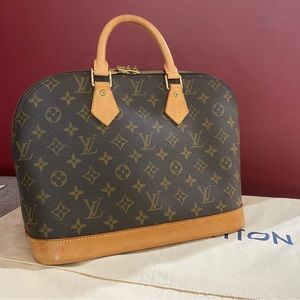 Authentic Louis Vuitton Alma with Dustbag